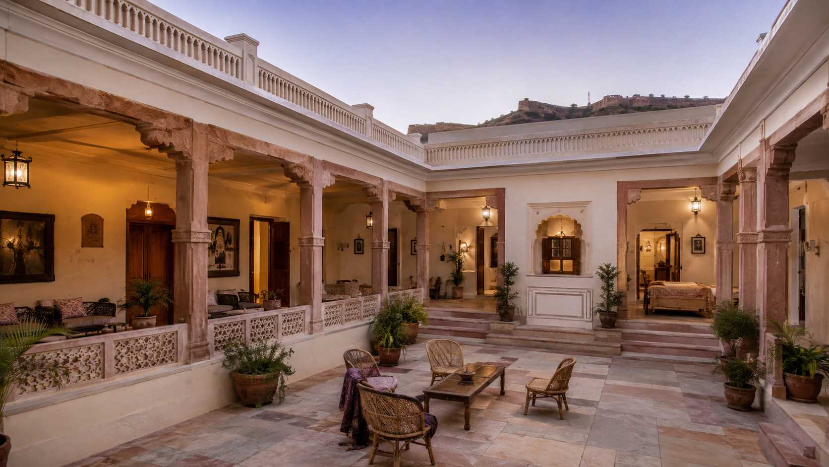 A restored residential haveli courtyard in Rajasthan at early evening